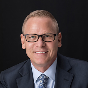 Steven Johnson, Vice President of Business Development, Marketing &amp; Communications, portrait-style headshot.